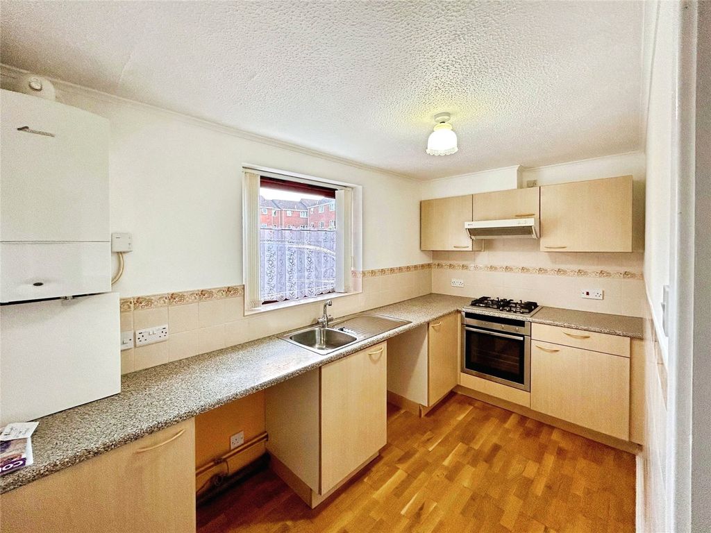 Property photo 3 of 8 Kitchen
