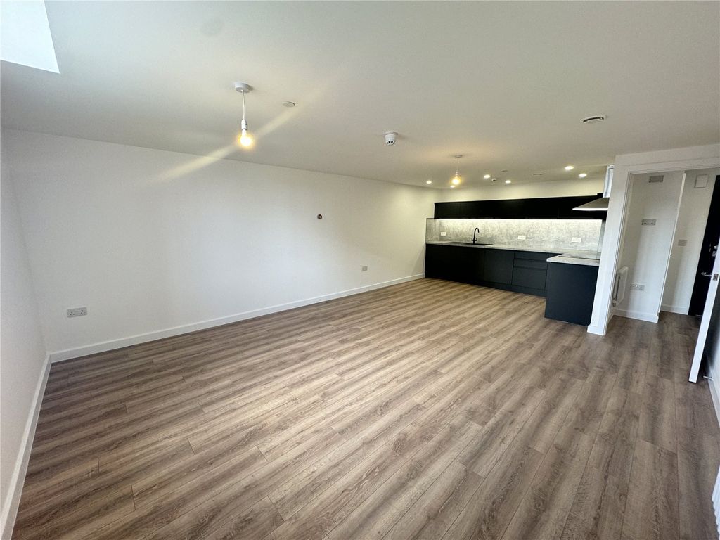 Property photo 3 of 8 Flat 203