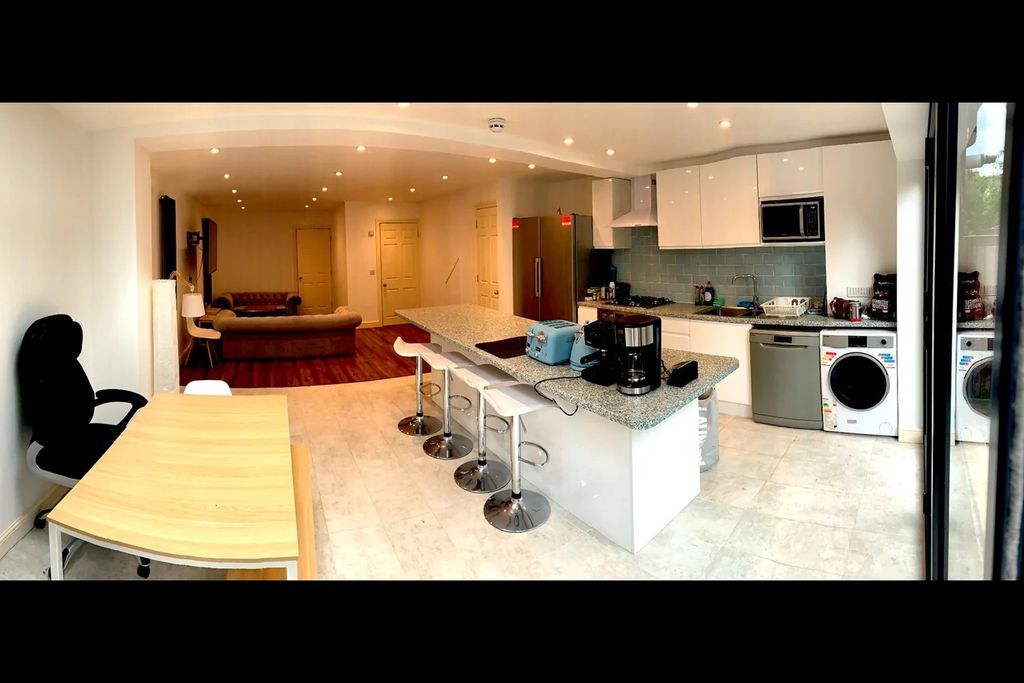 Property photo 3 of 8 Bright Open-Plan Kitchen With Large Breakfast Bar...