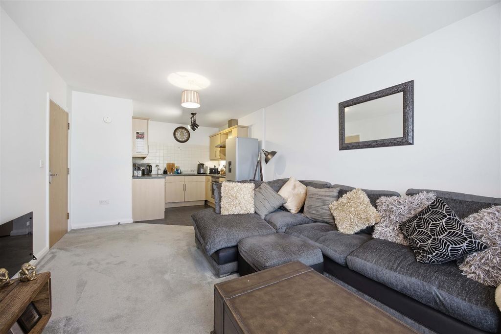 Property photo 3 of 12 Living Area
