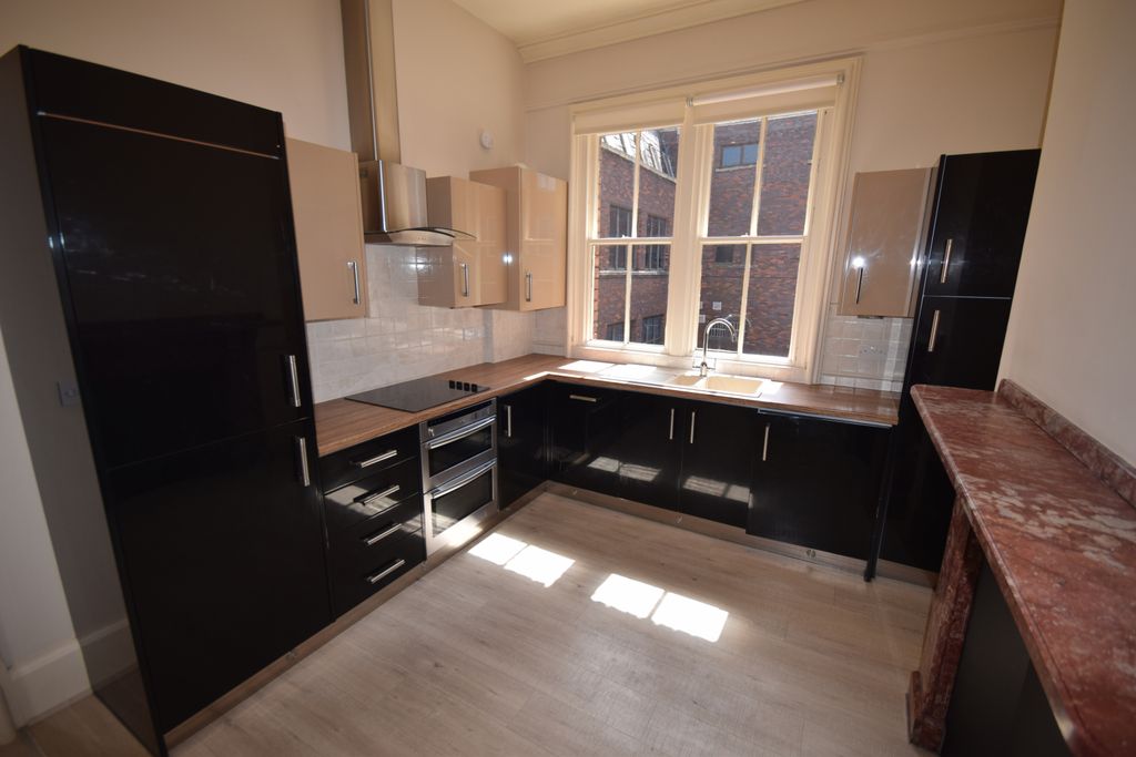 Property photo 3 of 7 Kitchen