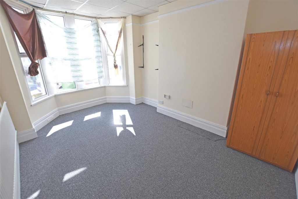 Property photo 2 of 12 Front Room.Jpg