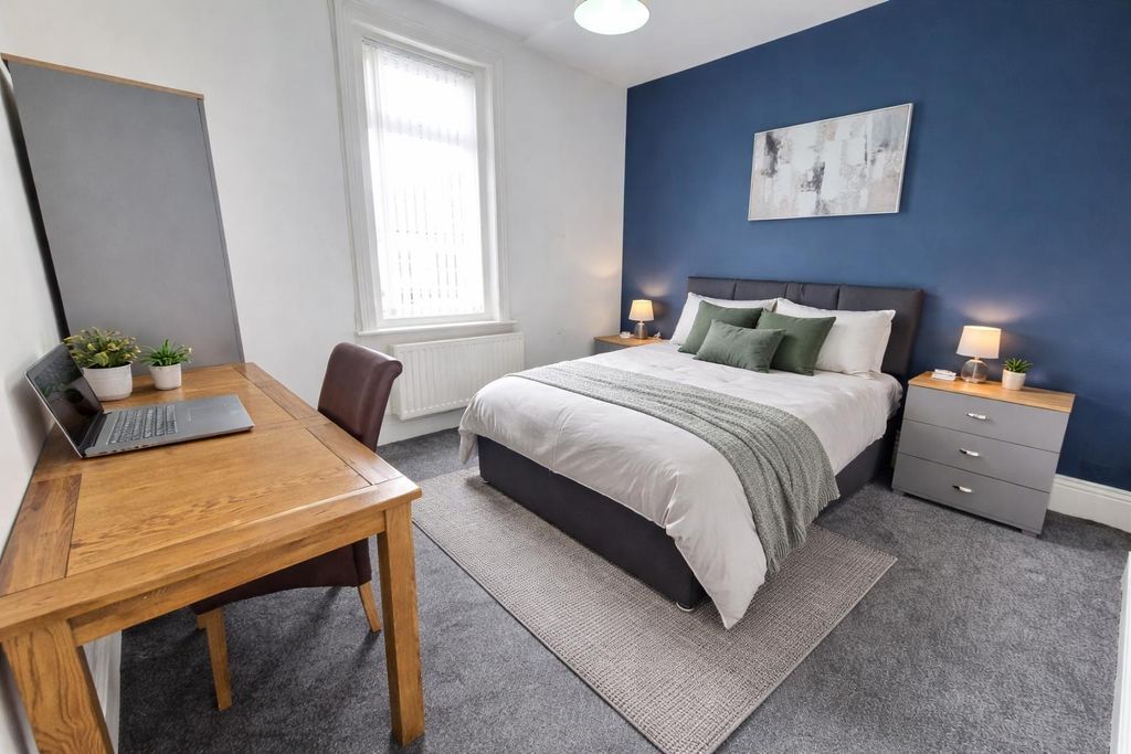 Property photo 1 of 20 Contemporary Bedroom With Sapphire Accents.Png