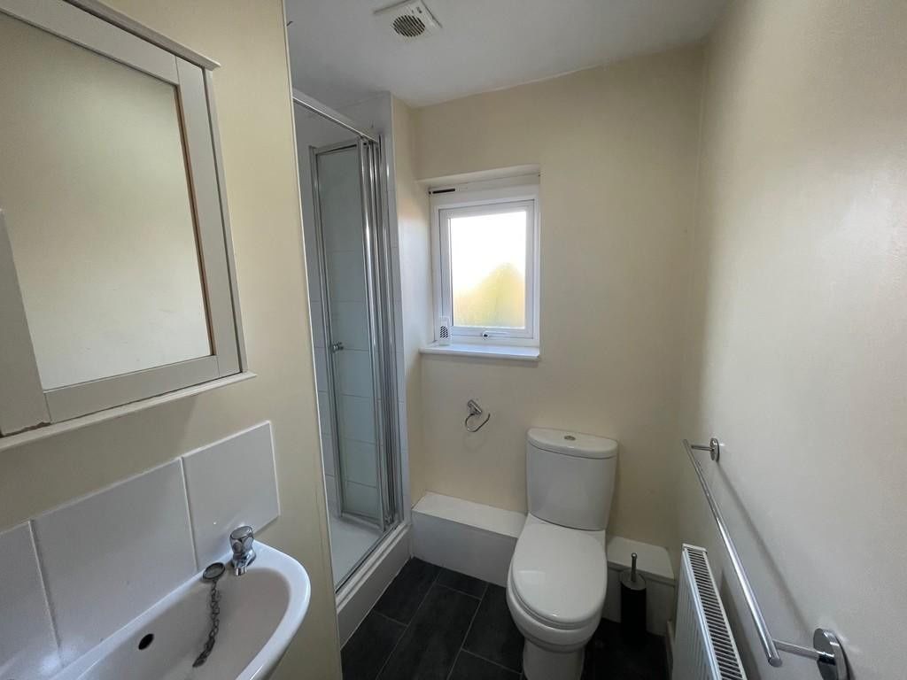 Property photo 3 of 6 A Clean And Well-Maintained Bathroom Featuring A S...