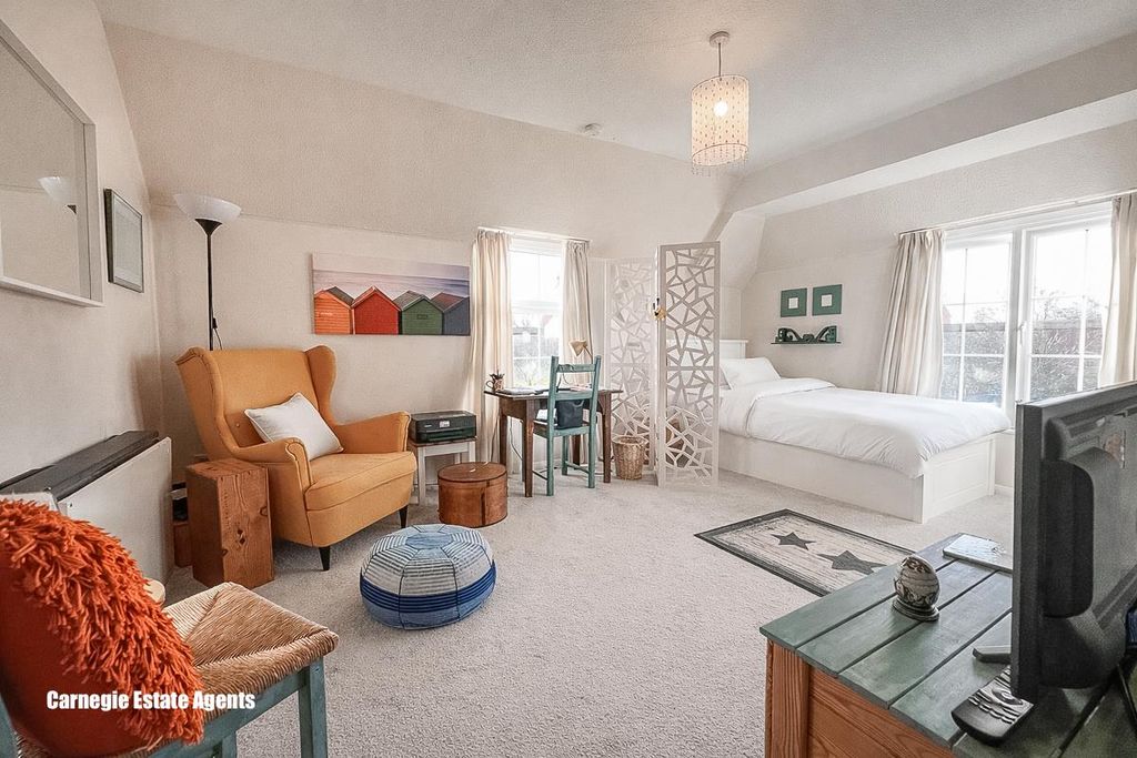 Property photo 2 of 11 Living Area