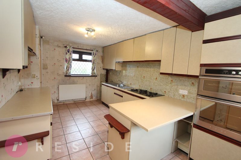 Property photo 3 of 12 Dining Kitchen