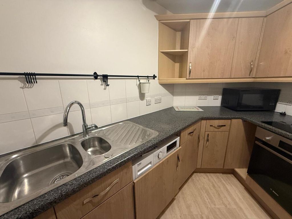 Property photo 3 of 13 Kitchen