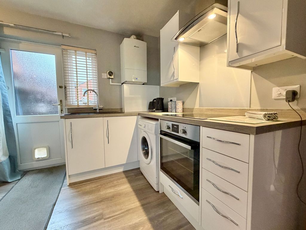 Property photo 3 of 13 Dining Kitchen