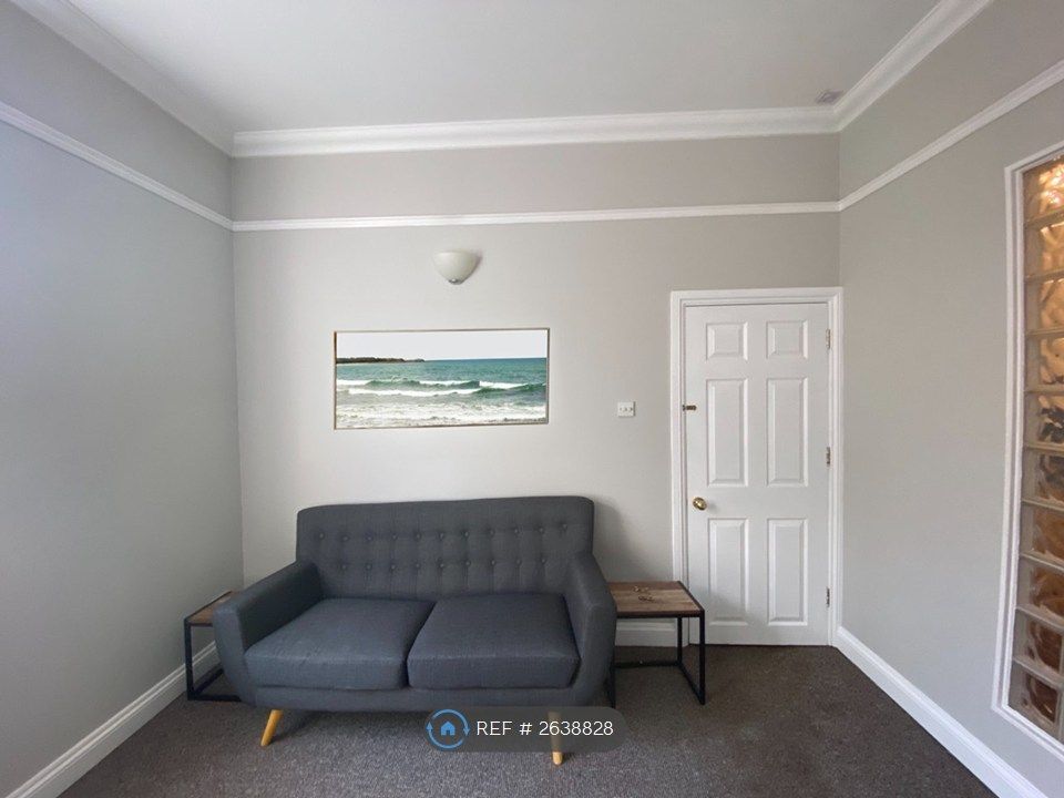 Property photo 2 of 8 Living Area