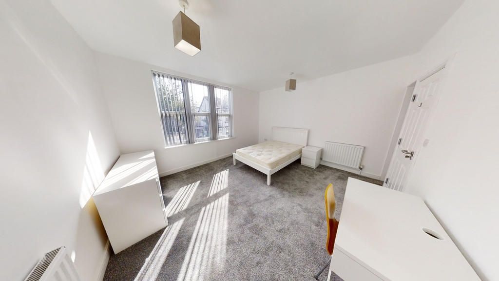 Property photo 2 of 8 Bright Double Bedroom Featuring Large Windows That...