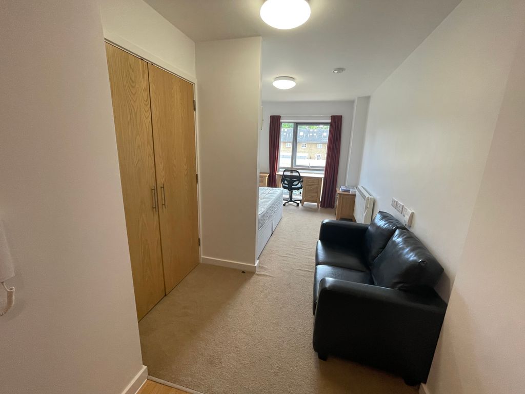 Property photo 3 of 12 Living Area