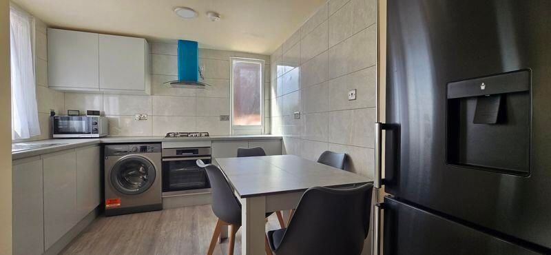 Property photo 3 of 6 A Modern And Functional Kitchen Equipped With Esse...