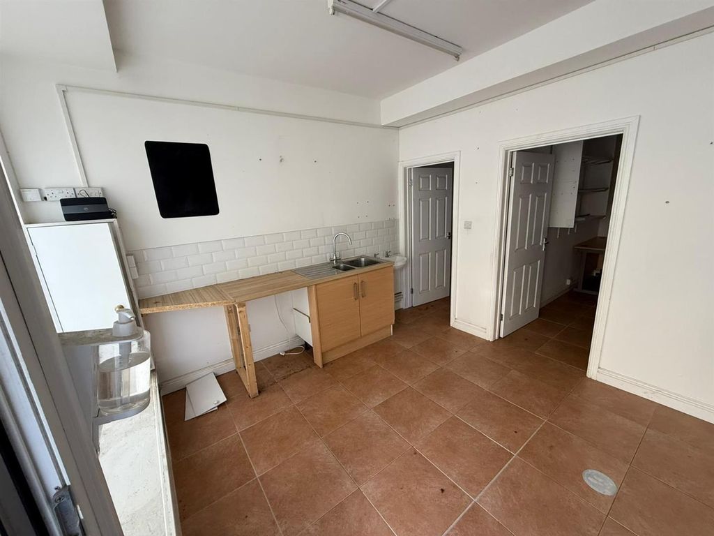 Property photo 2 of 12 Bright Kitchen With Tiled Floors And Workspace...