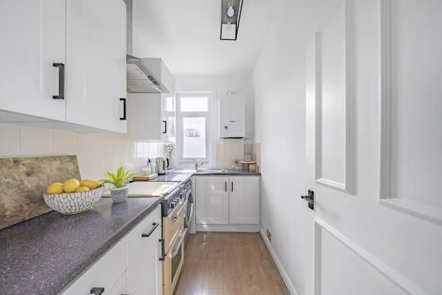 Property photo 3 of 12 Kitchen