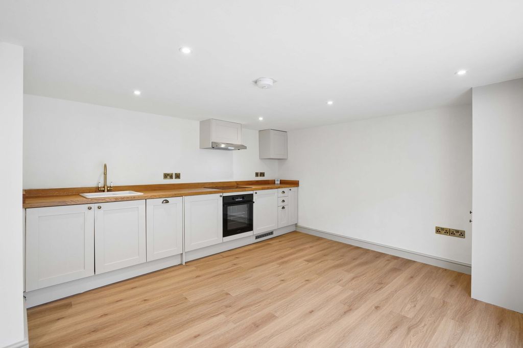 Property photo 3 of 11 Kitchen/Dining/Living Room