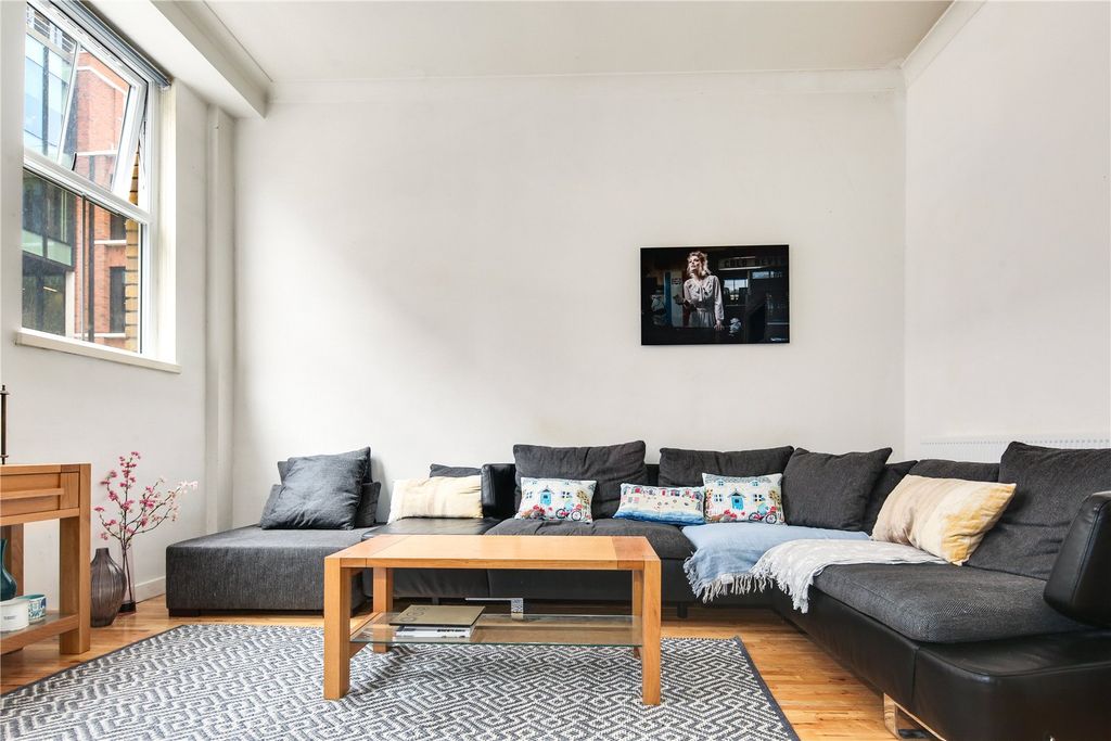 Property photo 3 of 12 Living Area