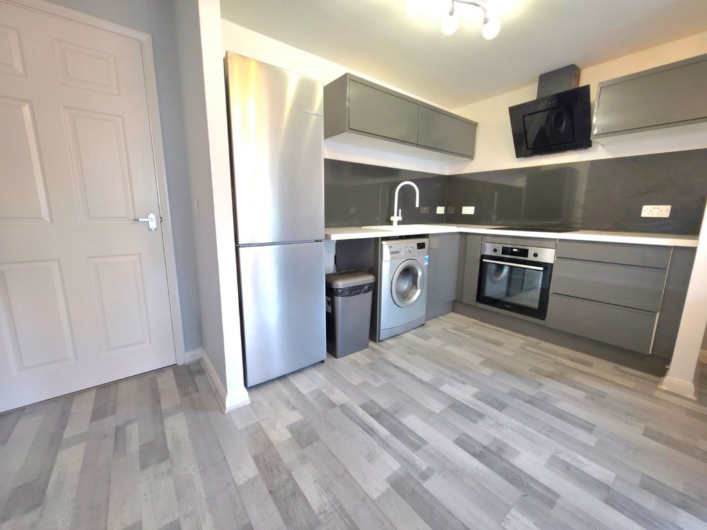 Property photo 3 of 12 Kitchen Area
