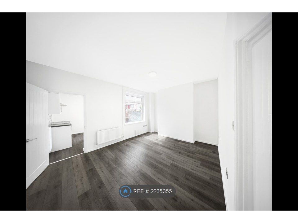 Property photo 3 of 12 Rear Living Room