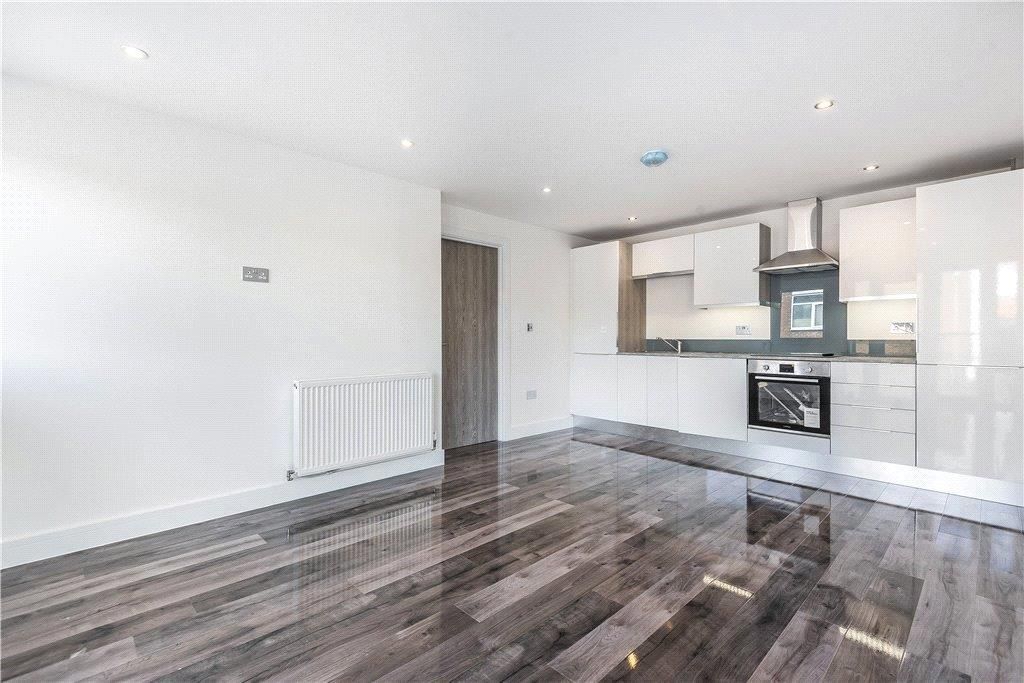 Property photo 3 of 12 Kitchen Living