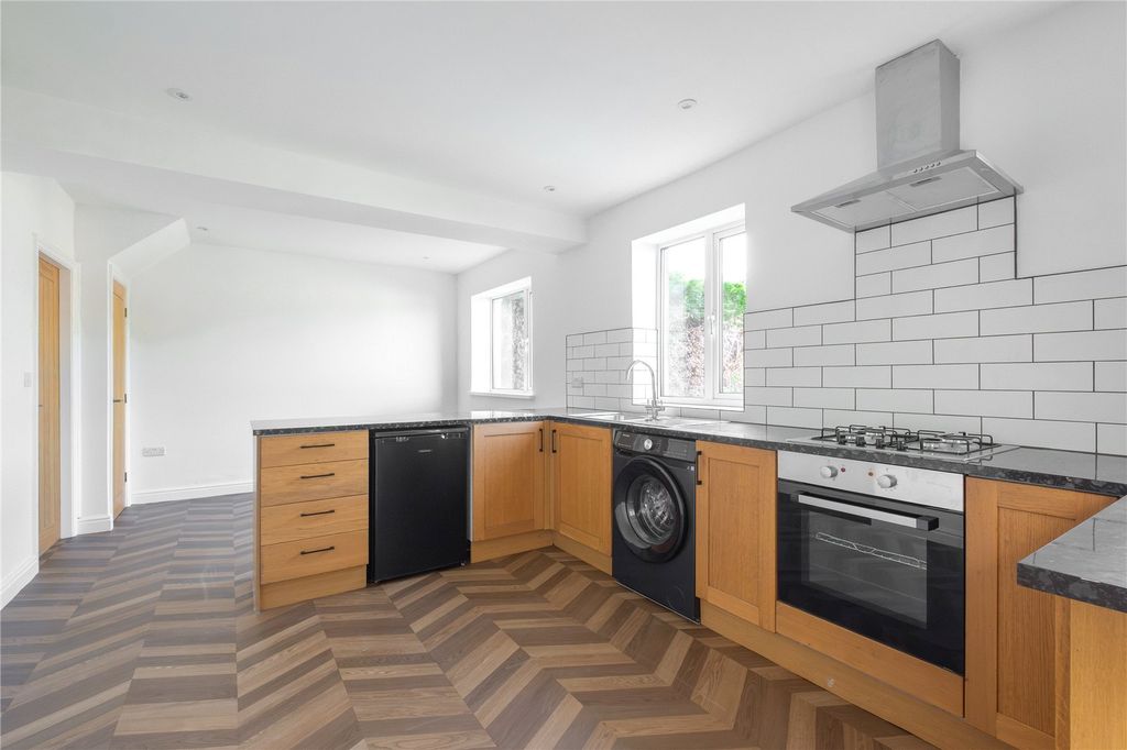 Property photo 3 of 21 Dining Kitchen