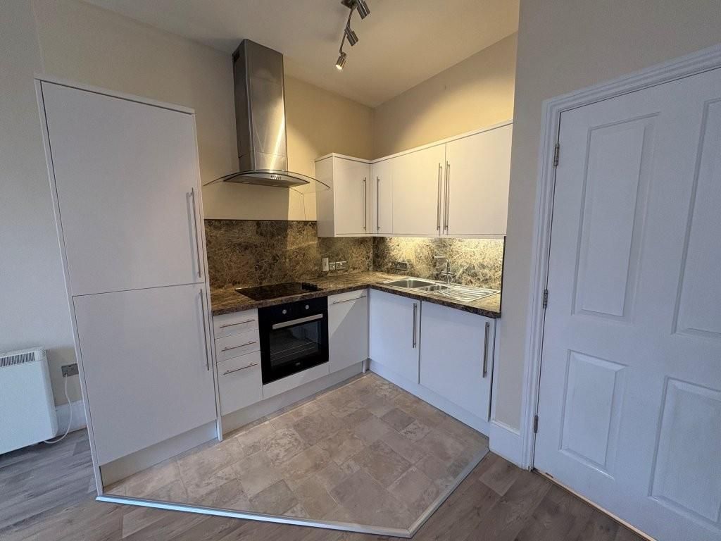 Property photo 3 of 9 Kitchen Area