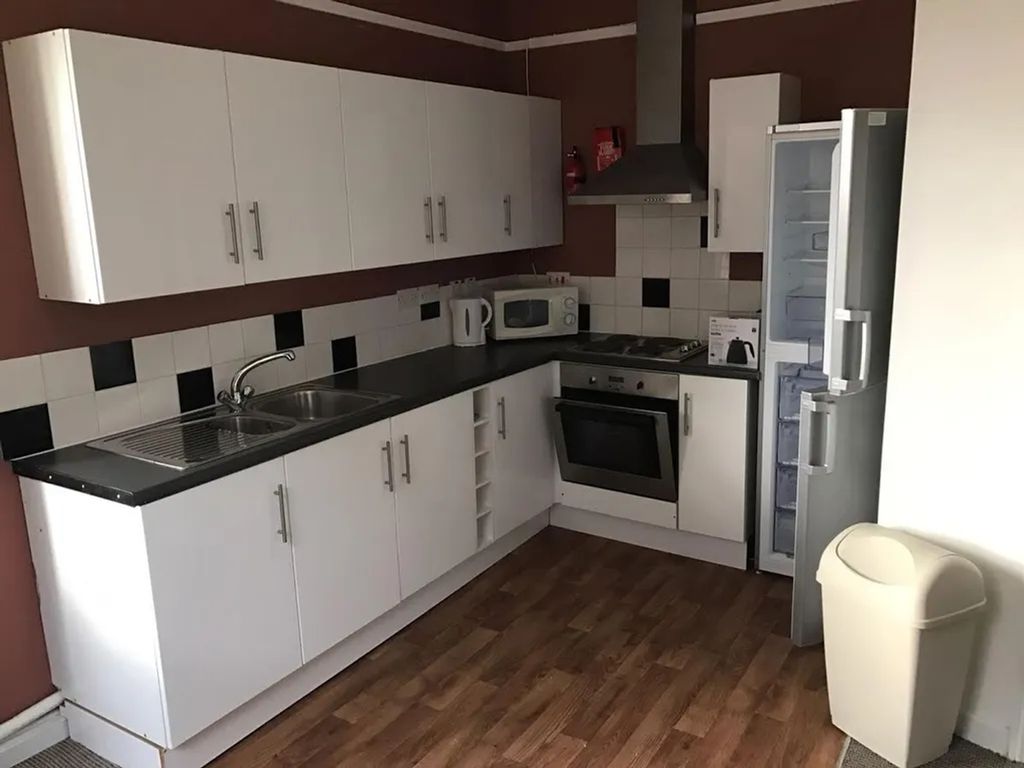 Property photo 3 of 5 A Modern Kitchenette With Ample Storage And Essent...