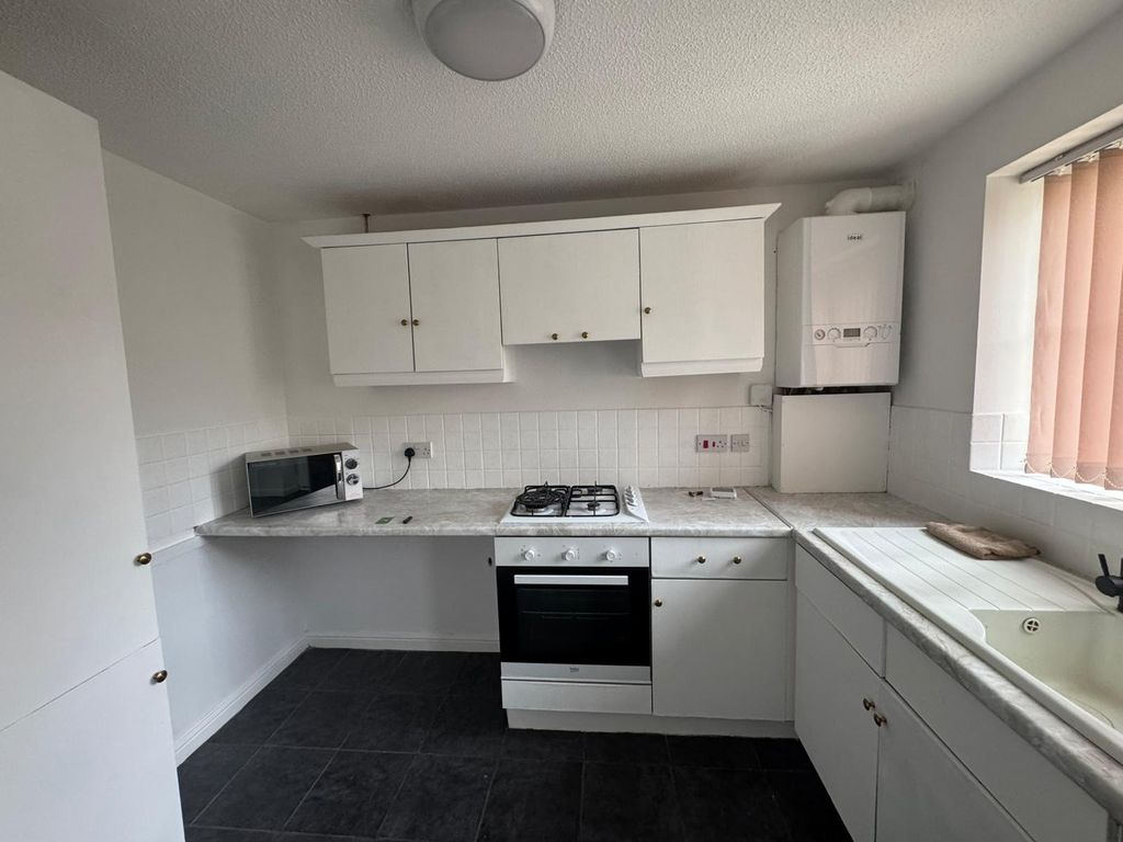 Property photo 3 of 7 Kitchen