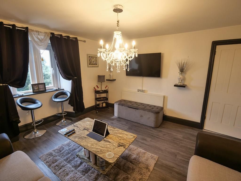 Property photo 3 of 12 Living Room