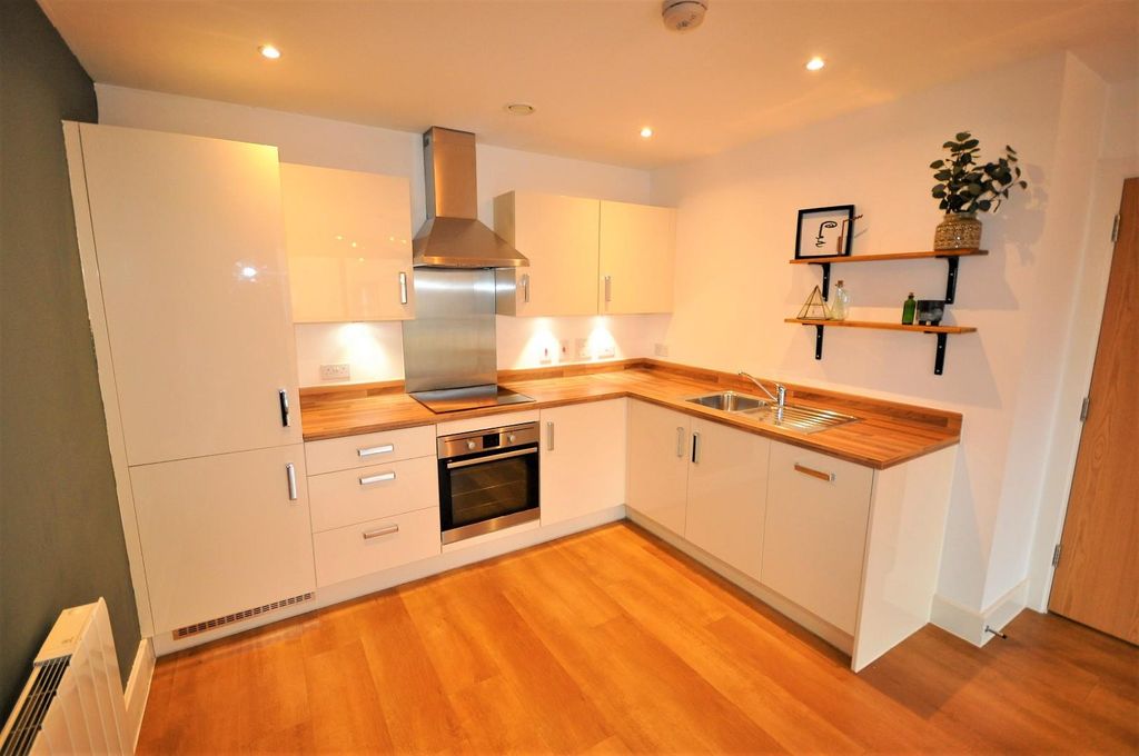 Property photo 3 of 17 Kitchen Area
