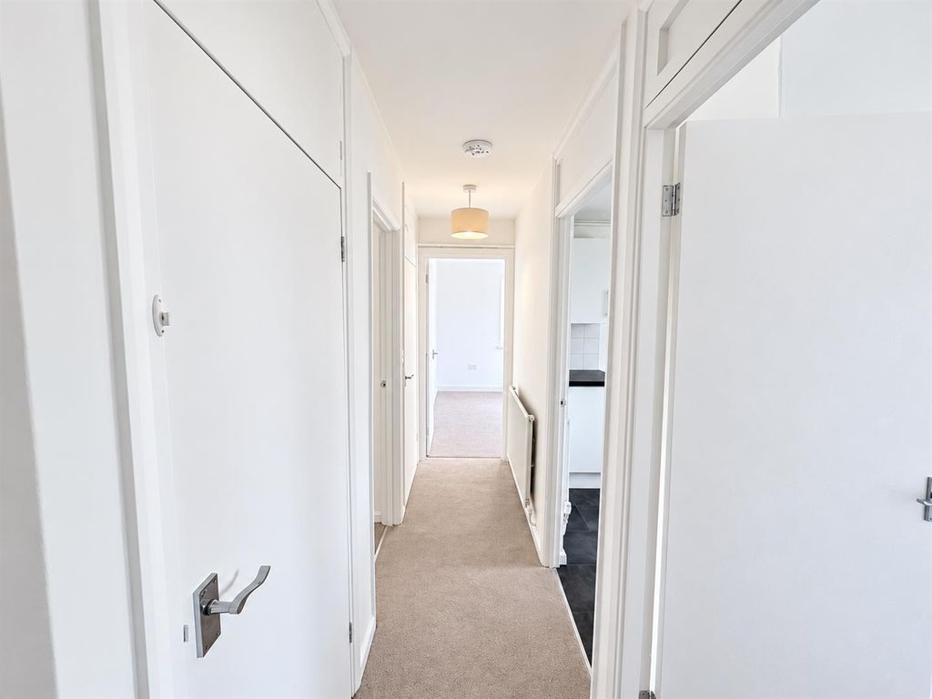 Property photo 3 of 6 Bright Minimalist Hallway Interior.Png