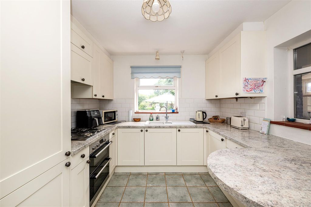 Property photo 3 of 16 Kitchen