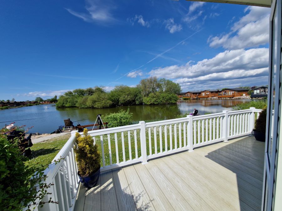 Property photo 2 of 18 South Facing Decking Overlooking The Lake