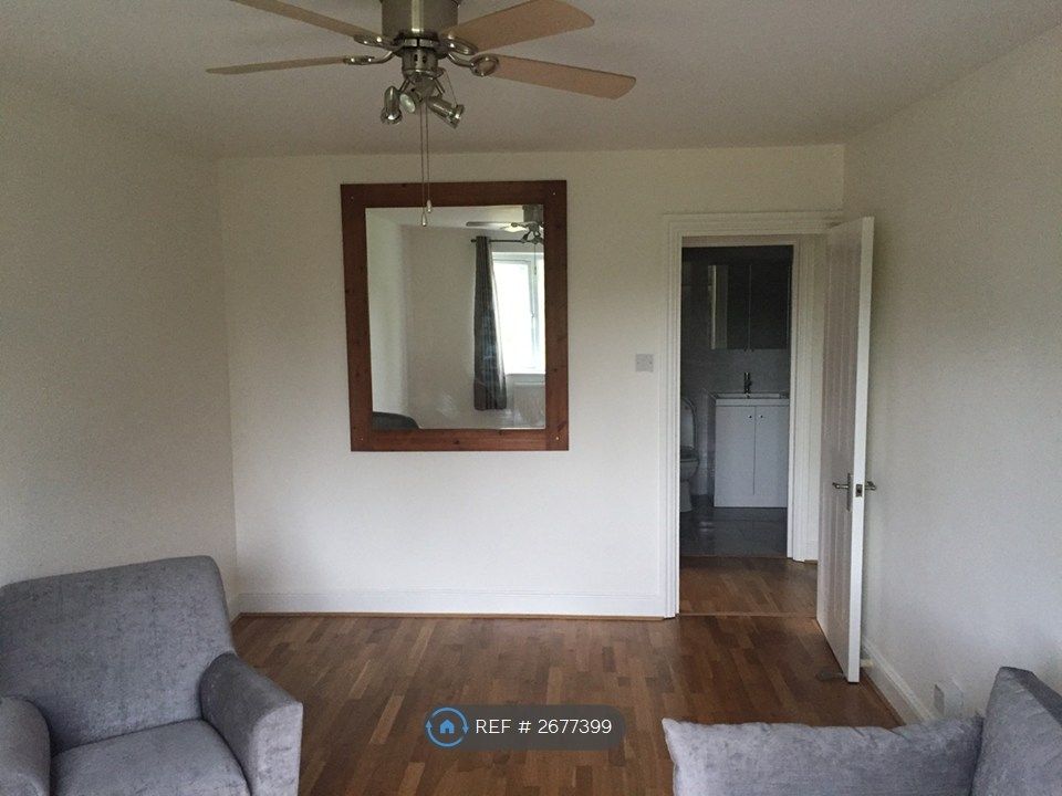 Property photo 2 of 8 Living Room With Windows Out To The Common