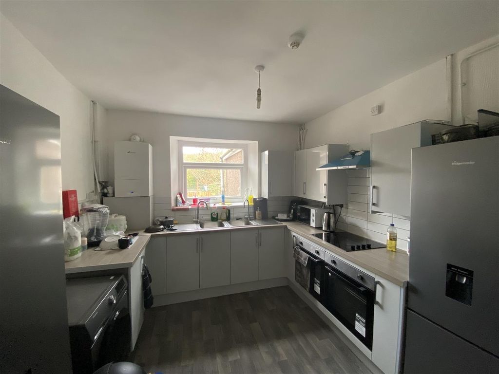 Property photo 3 of 4 Bright Kitchen With Modern Grey Cabinets....