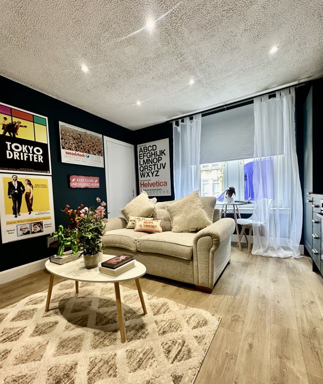 Property photo 1 of 8 Living Room (A)