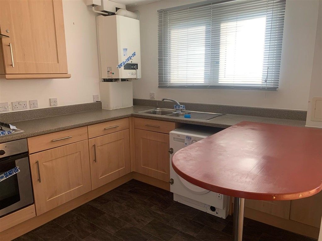 Property photo 3 of 7 Kitchen