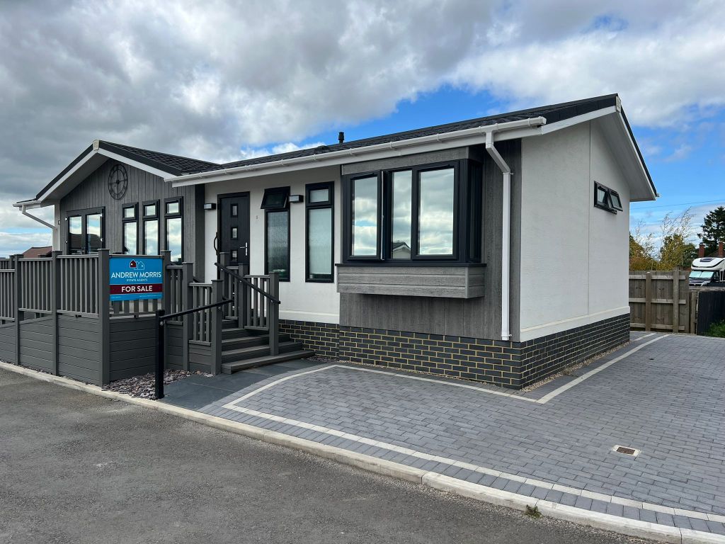 Property photo 1 of 10 New Front 1