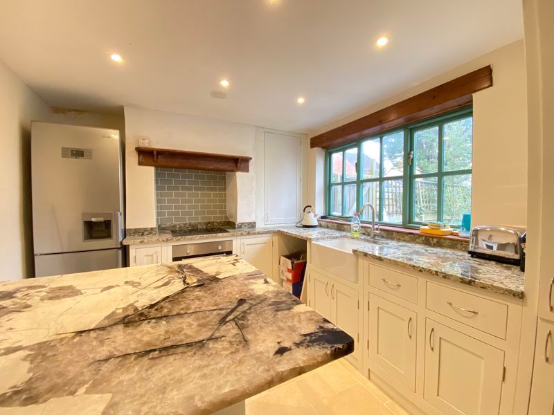 Property photo 3 of 13 Dining Kitchen
