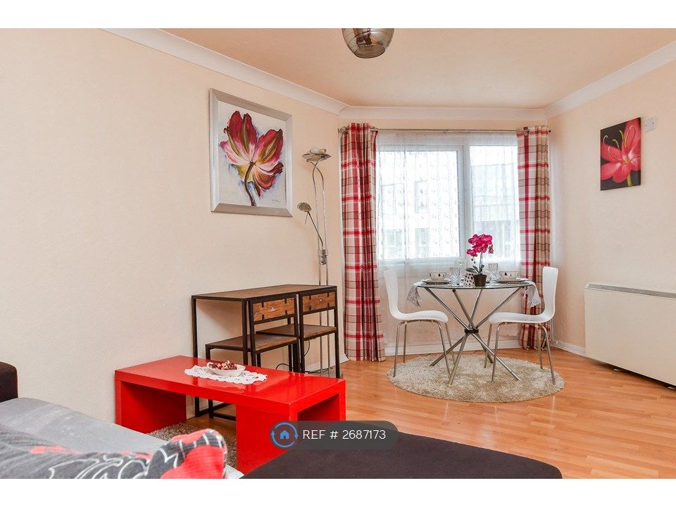 Property photo 3 of 11 Lounge + Dining Area