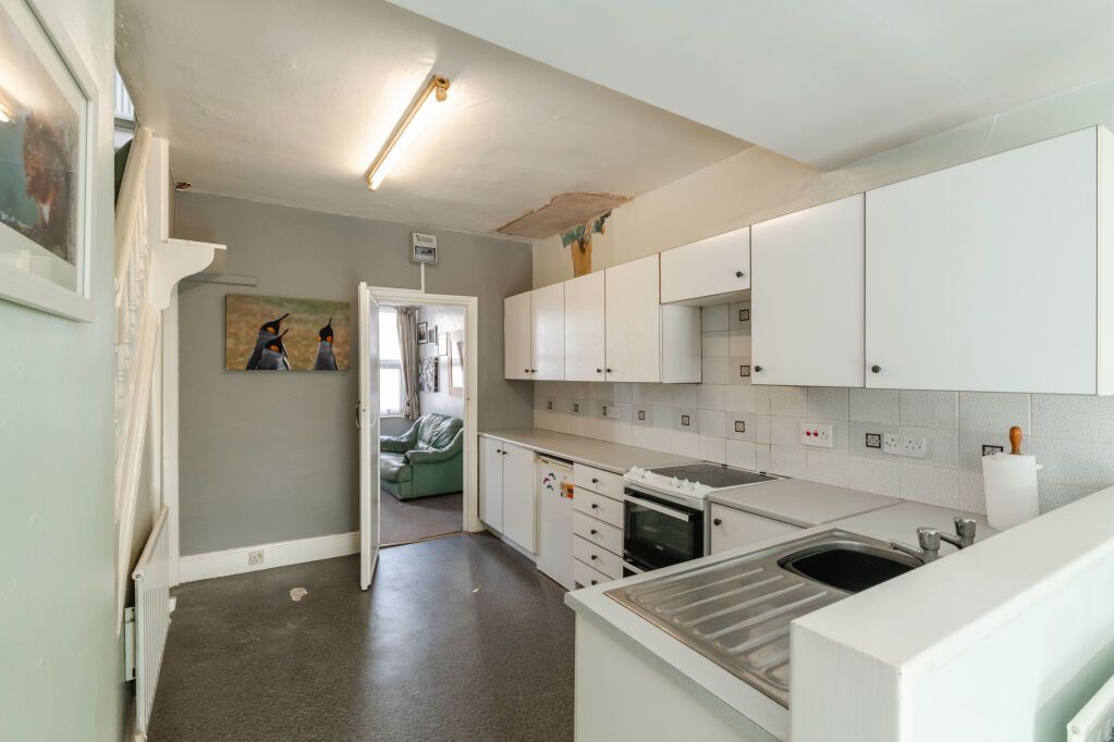 Property photo 3 of 12 Kitchen Area