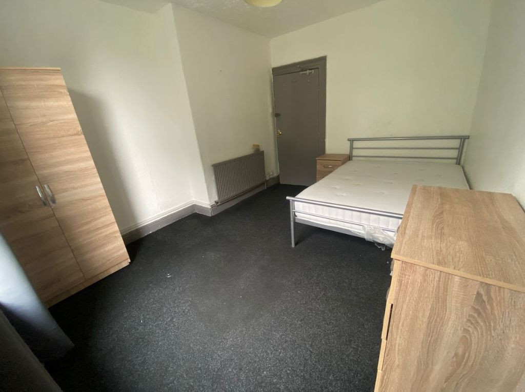 Property photo 3 of 8 A Tidy Double Bedroom Featuring A Sturdy Metal Fra...