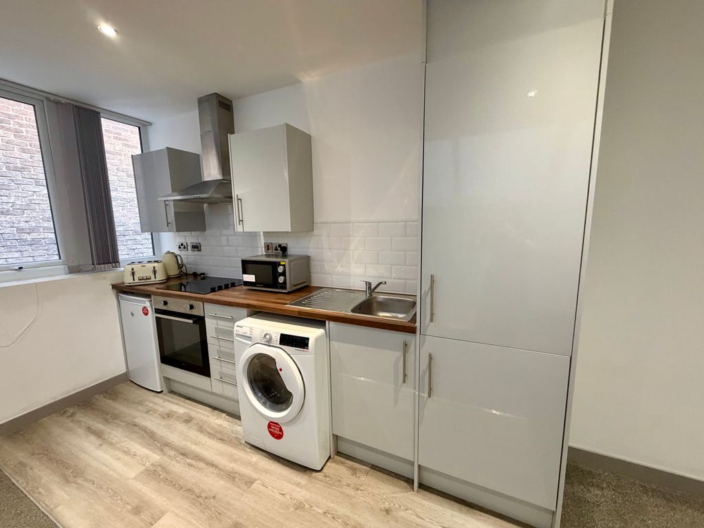 Property photo 1 of 4 Kitchen