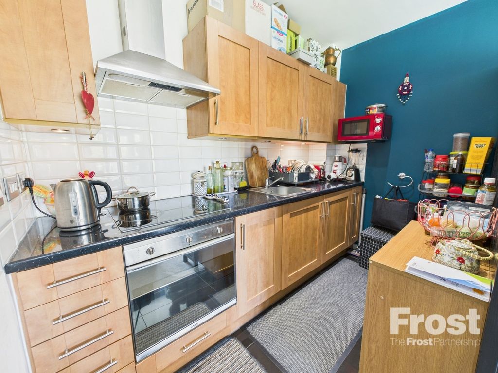 Property photo 3 of 12 Kitchen
