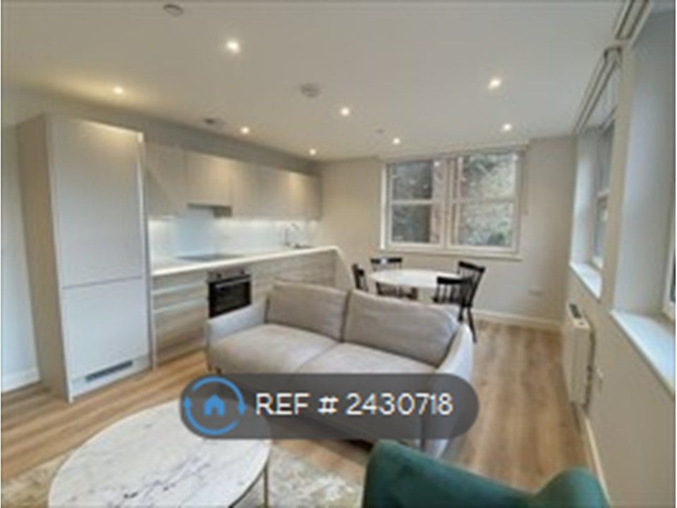 Property photo 3 of 11 Kitchen & Living Room
