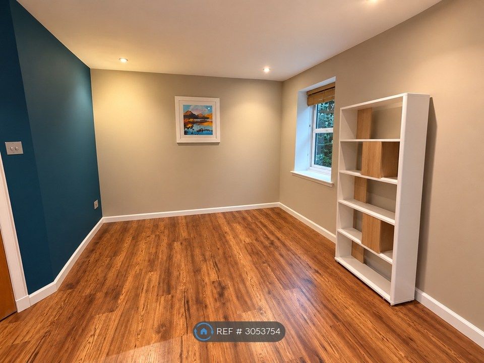 Property photo 3 of 17 Living Room Area With Bookshelf