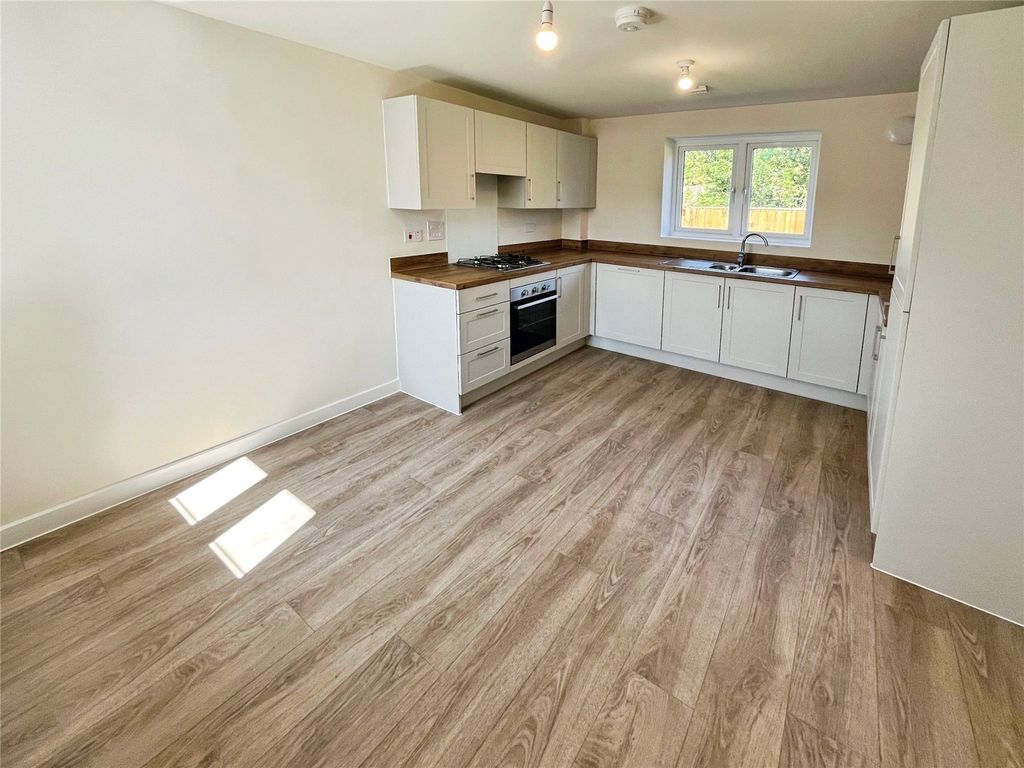 Property photo 3 of 12 Dining Kitchen
