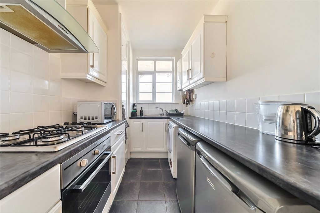 Property photo 3 of 12 Kitchen