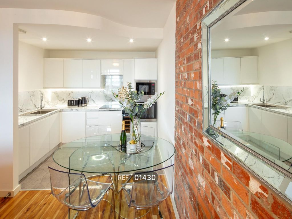 Property photo 1 of 11 Kitchen/Living Area