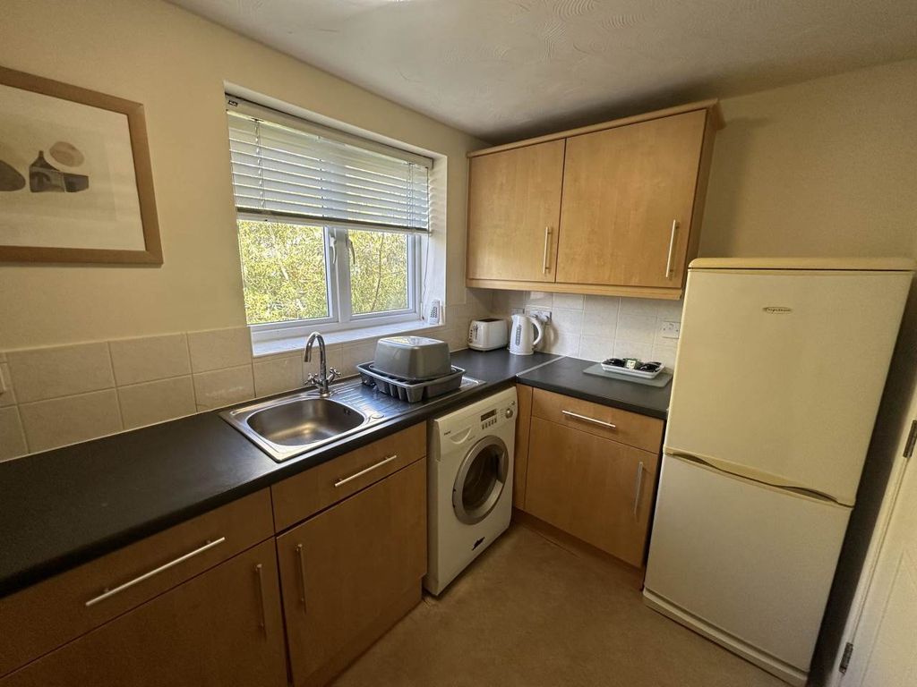 Property photo 3 of 13 Kitchen At 71