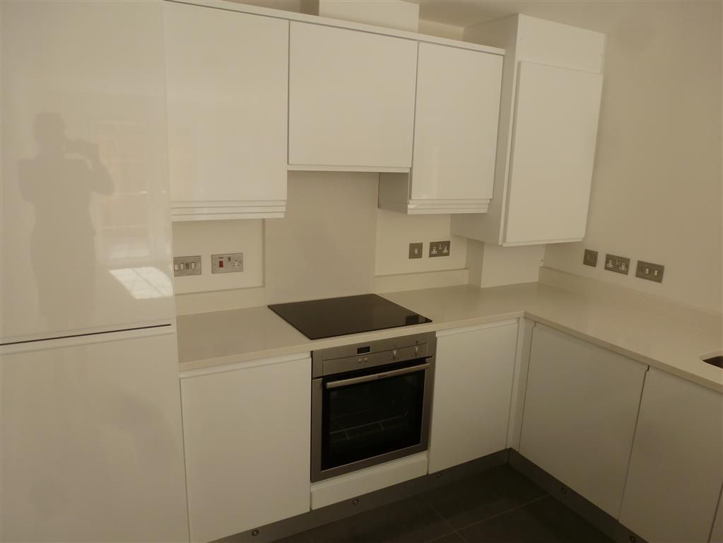 Property photo 3 of 8 Kitchen